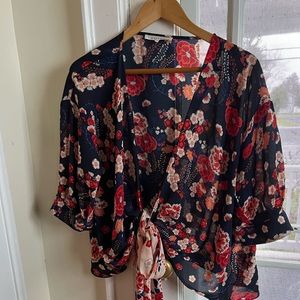 Beautiful like new silky wrap around top
